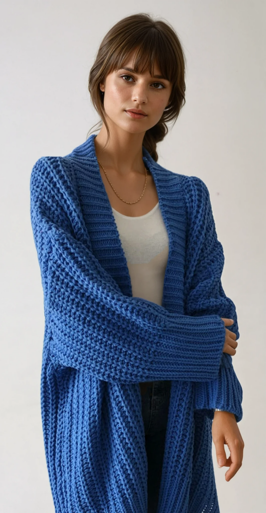 Blue oversized open-front split knit cardigan with a relaxed drape