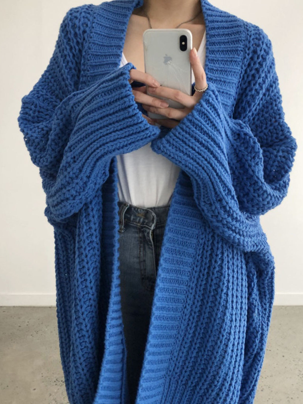 Blue oversized open-front split knit cardigan with a relaxed drape