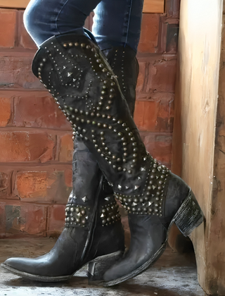 Knee-high pointed-toe boots with a mid block heel and side zipper