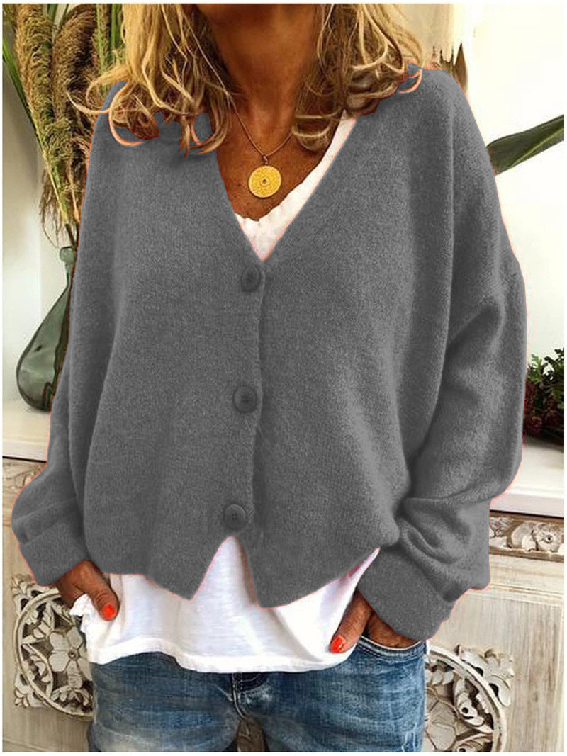 Women's V-neck button-front knit cardigan with long sleeves in a relaxed, slightly cropped fit