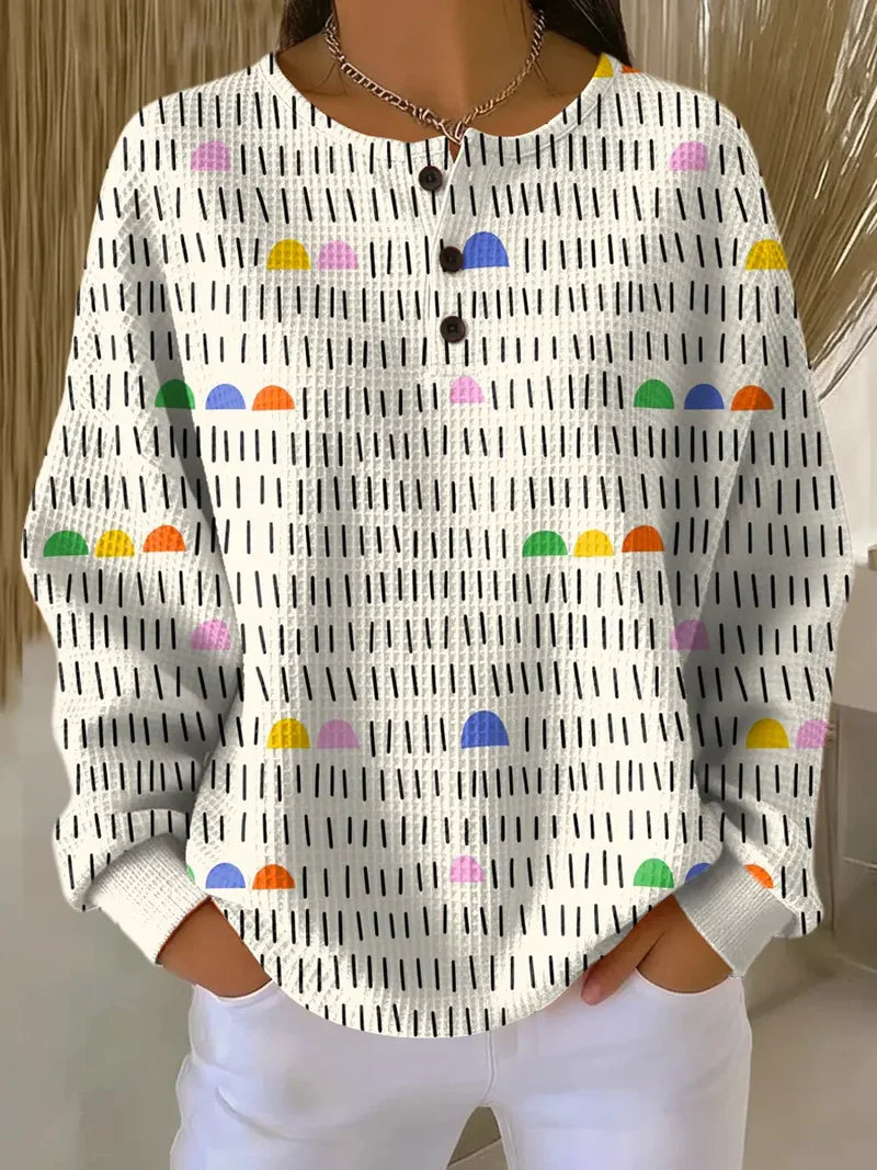 Women's waffle-knit sweatshirt with abstract art print and relaxed casual fit