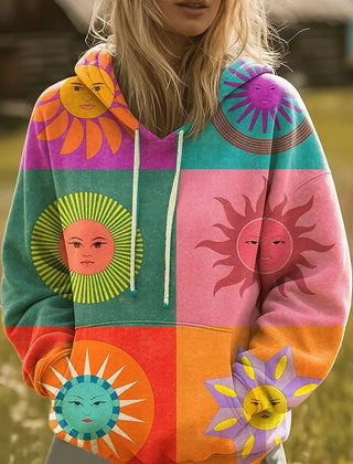 Relaxed-fit hoodie with a colorful rainbow sunburst graphic print and hood