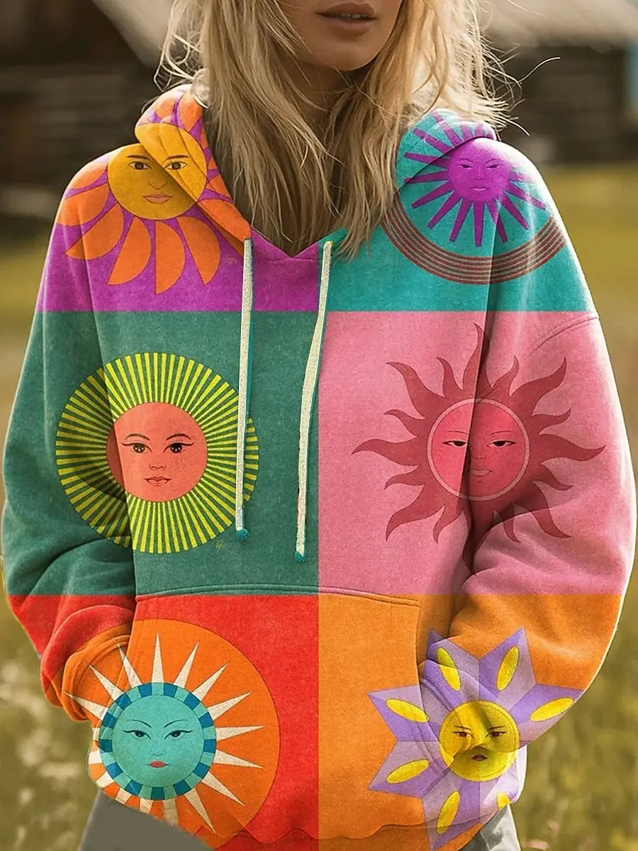 Relaxed-fit hoodie with a colorful rainbow sunburst graphic print and hood
