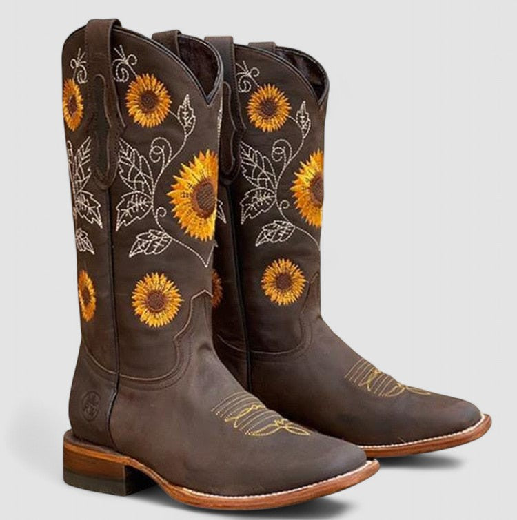 Sunflower-embroidered western boots with pointed toe and stacked block heel in warm brown