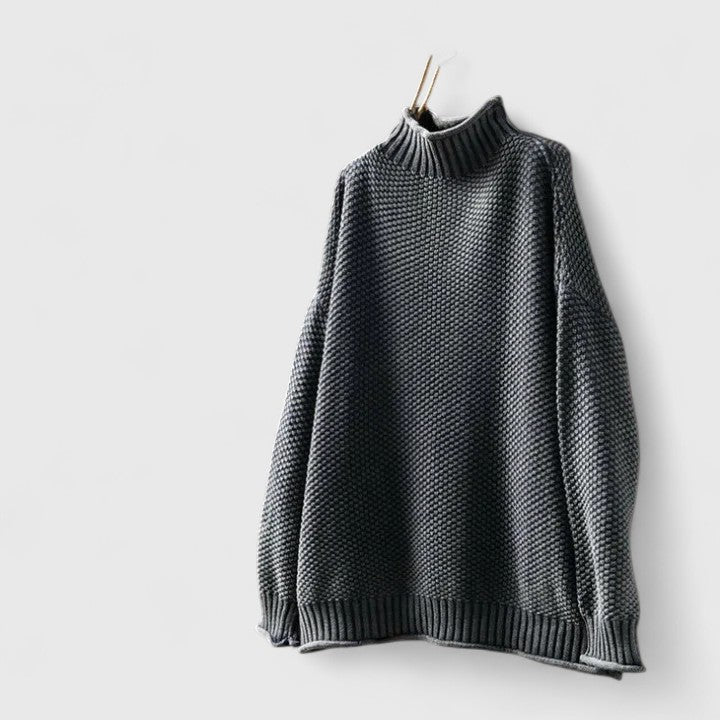 Women's textured knit mock neck sweater with ribbed cuffs and relaxed fit
