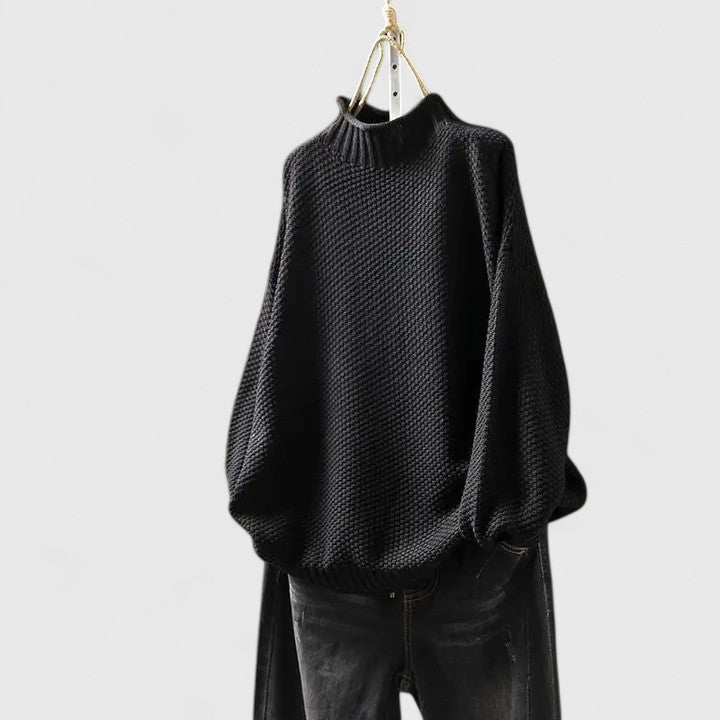 Women's textured knit mock neck sweater with ribbed cuffs and relaxed fit