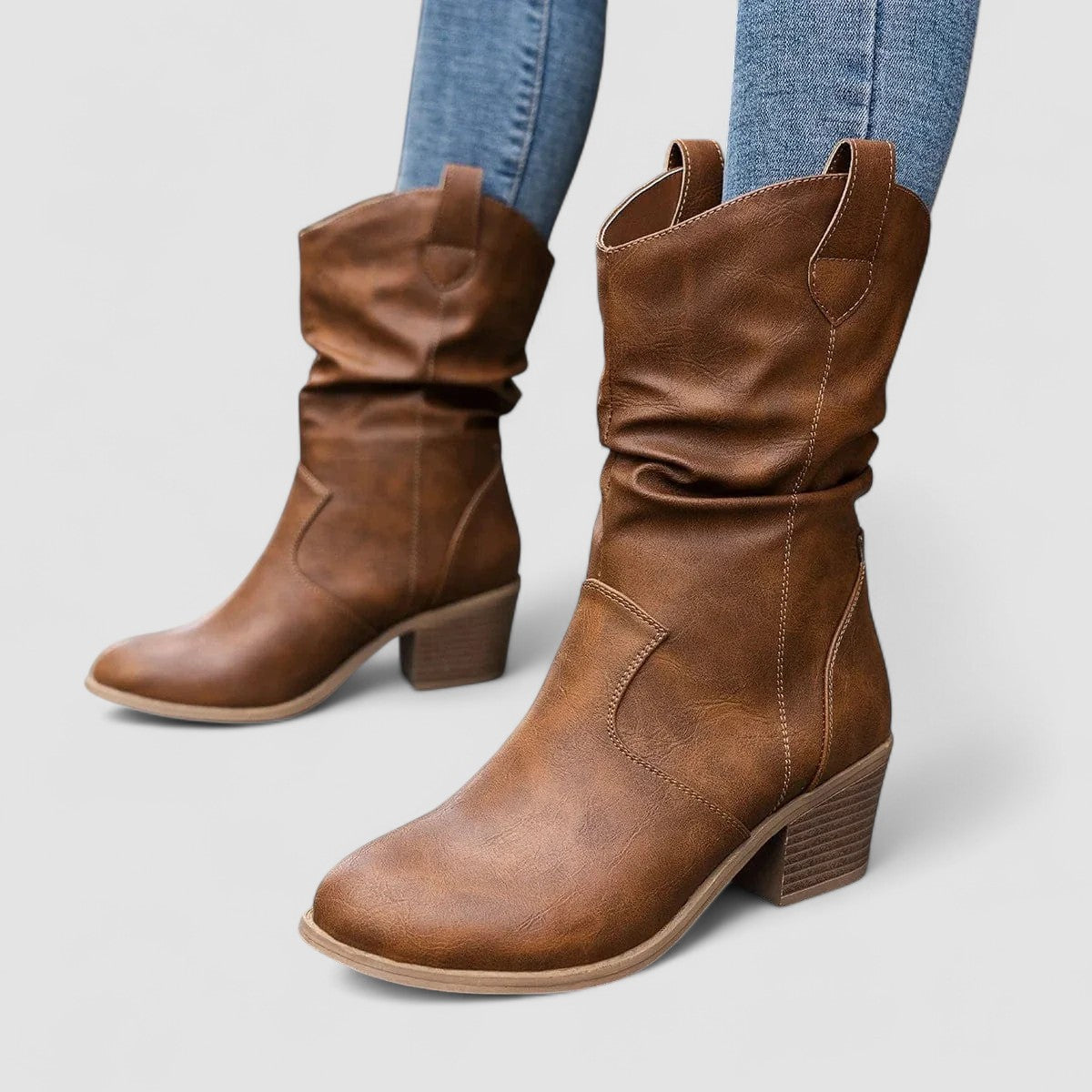Slouch block-heel pull-on boots with relaxed shaft, shown in brown and black