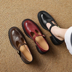 Rowena chunky block heel Mary Jane pumps with T-strap gold buckle and round toe