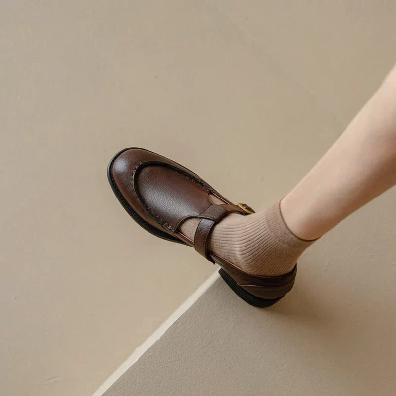 Delia retro T-strap Mary Jane shoes with rounded toe, gold-tone buckle and low block heel