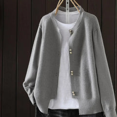 Women's V-neck button front cardigan with ribbed cuffs and hem in a solid shade