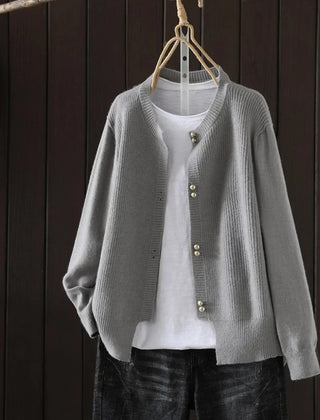Women's V-neck button front cardigan with ribbed cuffs and hem in a solid shade