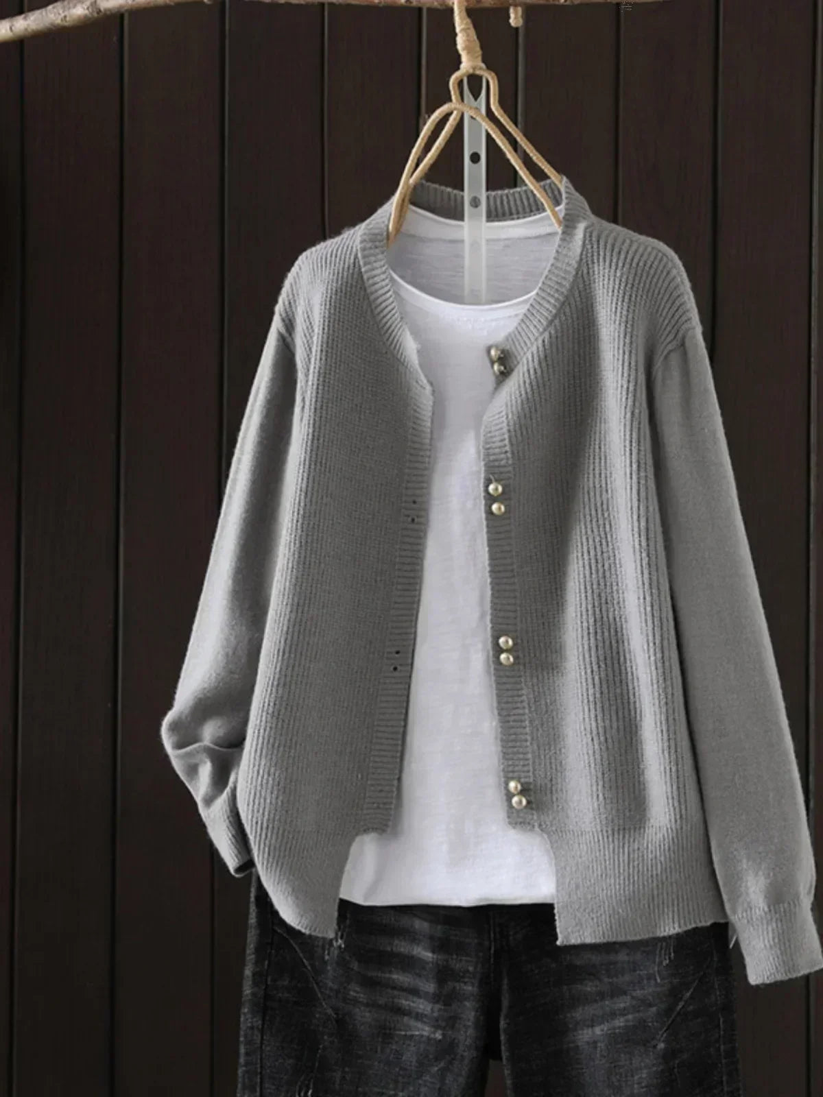 Women's V-neck button front cardigan with ribbed cuffs and hem in a solid shade