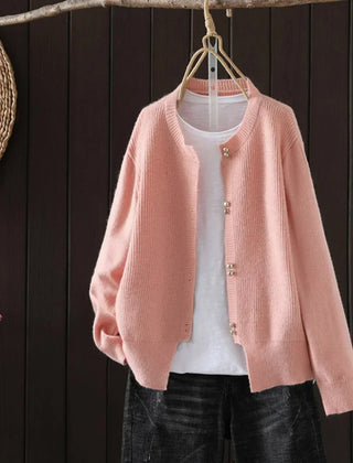 Women's V-neck button front cardigan with ribbed cuffs and hem in a solid shade