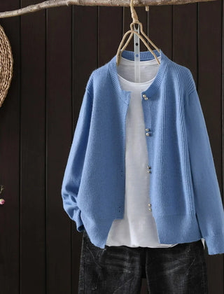 Women's V-neck button front cardigan with ribbed cuffs and hem in a solid shade