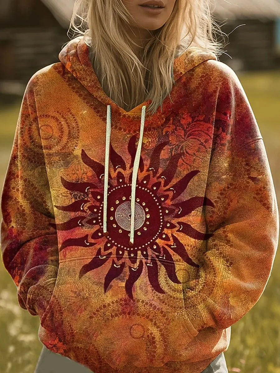 Multicolor rainbow sunburst graphic hoodie with hood and ribbed cuffs, relaxed fit