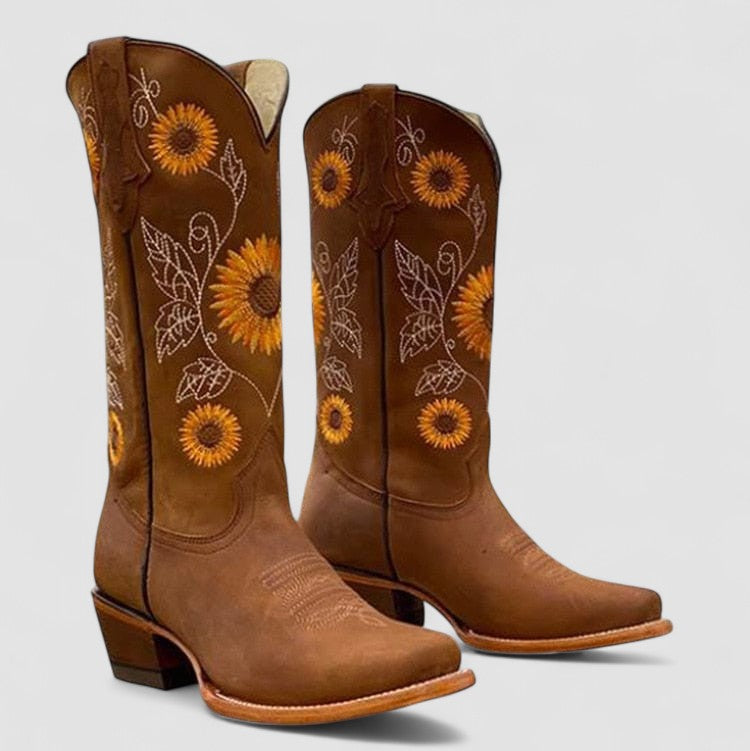 Sunflower-embroidered western boots with pointed toe and stacked block heel in warm brown