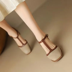 Off-white perforated T-strap block heel pump with contrast tan strap and square toe
