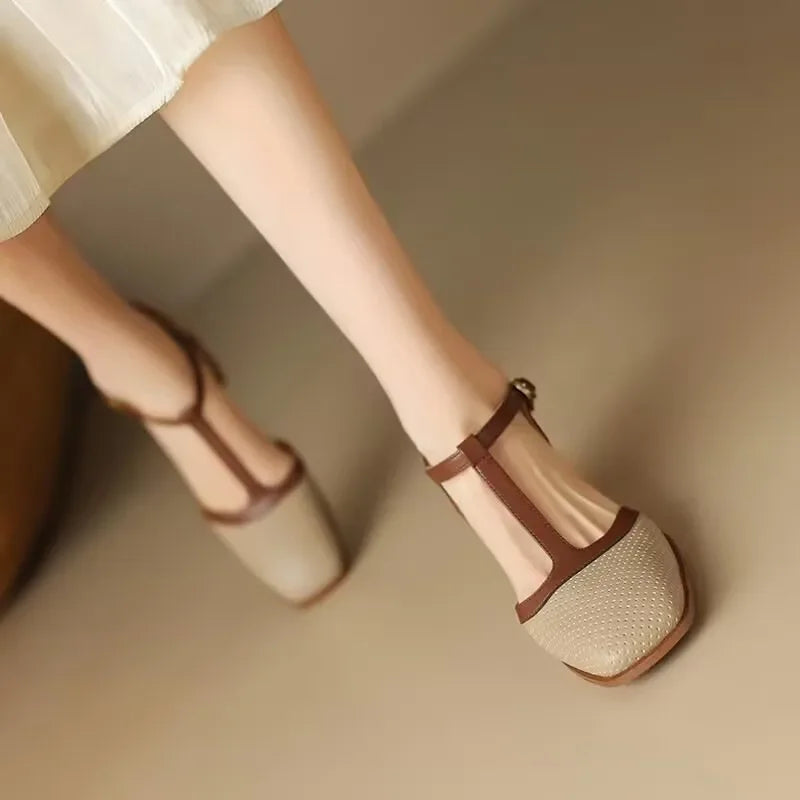 Off-white perforated T-strap block heel pump with contrast tan strap and square toe