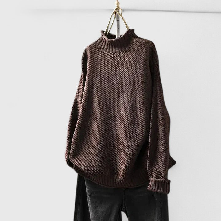 Women's textured knit mock neck sweater with ribbed cuffs and relaxed fit