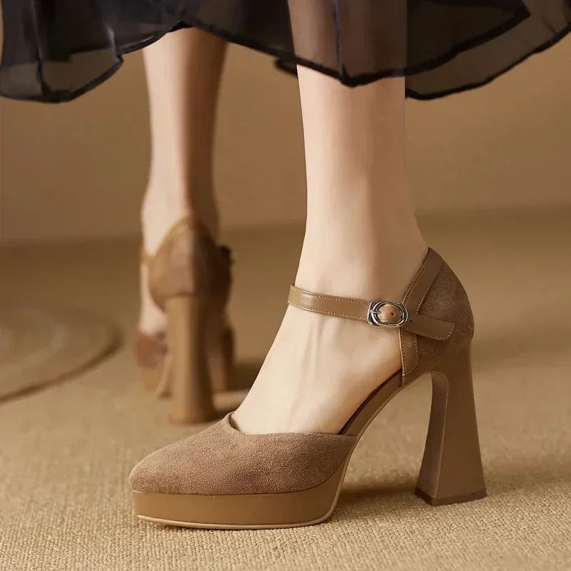 Aurore platform block heel pumps with slim ankle strap and rounded toe, in brown and black