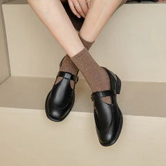 Delia retro T-strap Mary Jane shoes with rounded toe, gold-tone buckle and low block heel