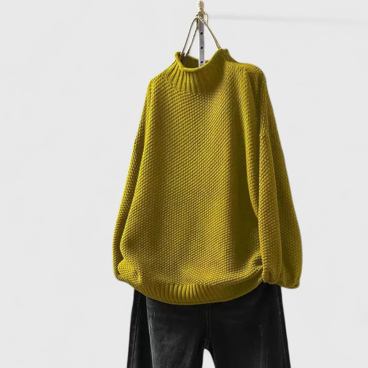 Women's textured knit mock neck sweater with ribbed cuffs and relaxed fit