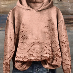 Women's floral eyelet pullover hoodie with structured hood and scalloped hem