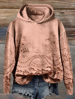 Women's floral eyelet pullover hoodie with structured hood and scalloped hem