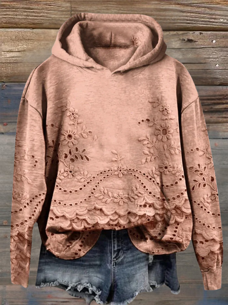 Women's floral eyelet pullover hoodie with structured hood and scalloped hem