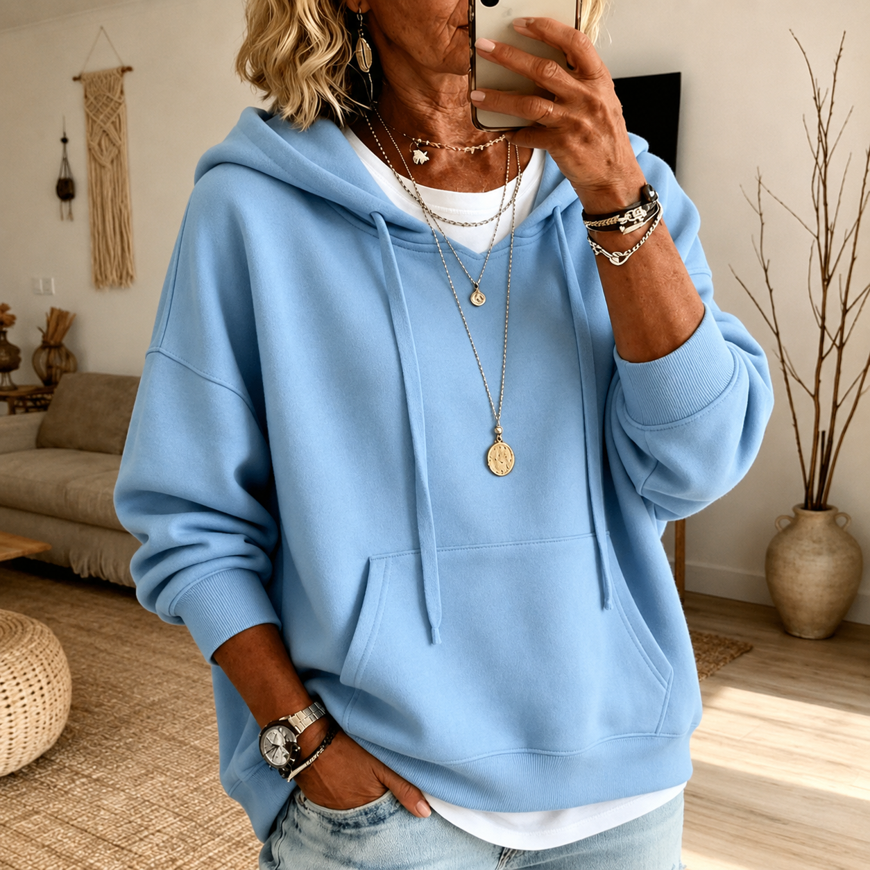 Sky blue oversized hoodie with drawstring hood and kangaroo pocket