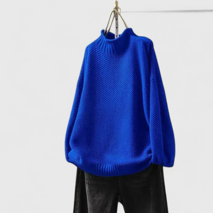Women's textured knit mock neck sweater with ribbed cuffs and relaxed fit