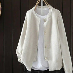 Women's V-neck button front cardigan with ribbed cuffs and hem in a solid shade