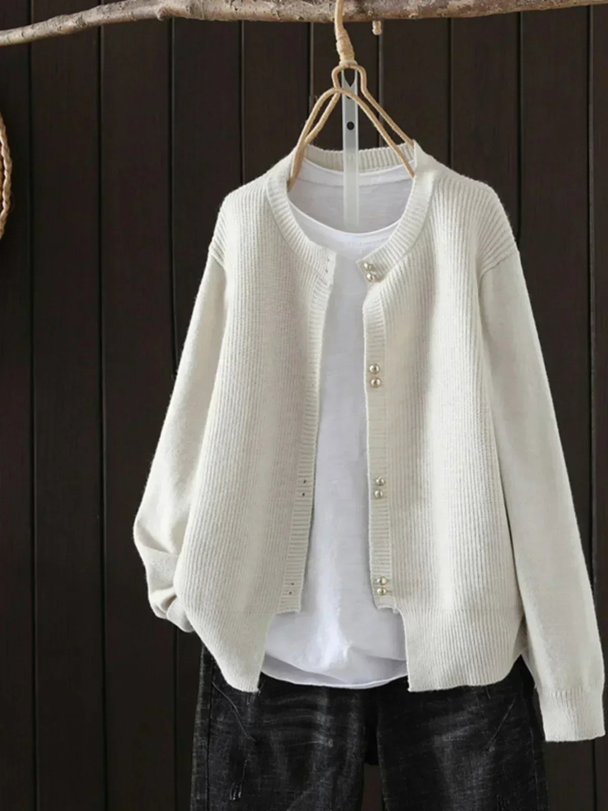 Women's V-neck button front cardigan with ribbed cuffs and hem in a solid shade