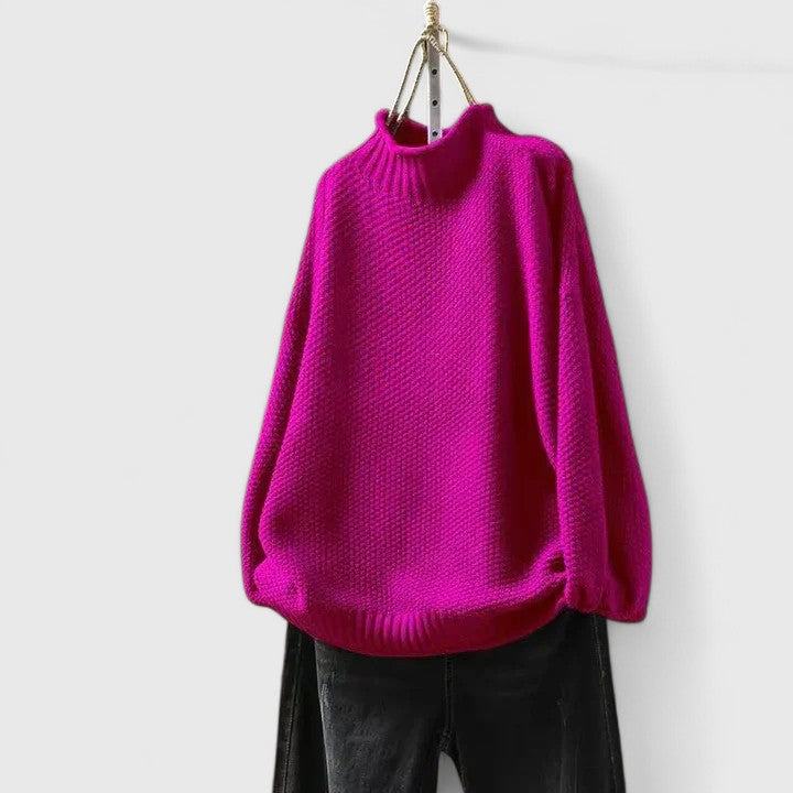 Women's textured knit mock neck sweater with ribbed cuffs and relaxed fit