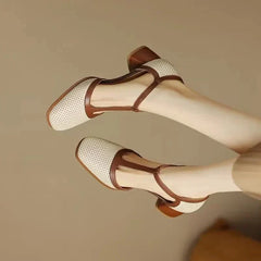 Off-white perforated T-strap block heel pump with contrast tan strap and square toe