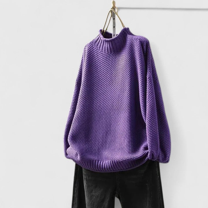 Women's textured knit mock neck sweater with ribbed cuffs and relaxed fit
