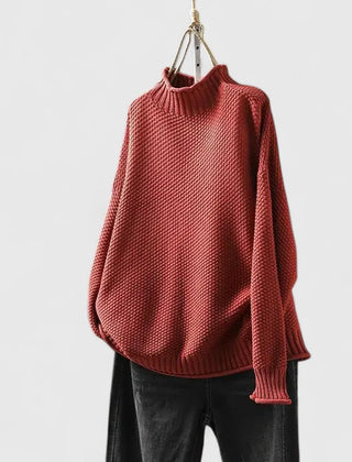 Women's textured knit mock neck sweater with ribbed cuffs and relaxed fit