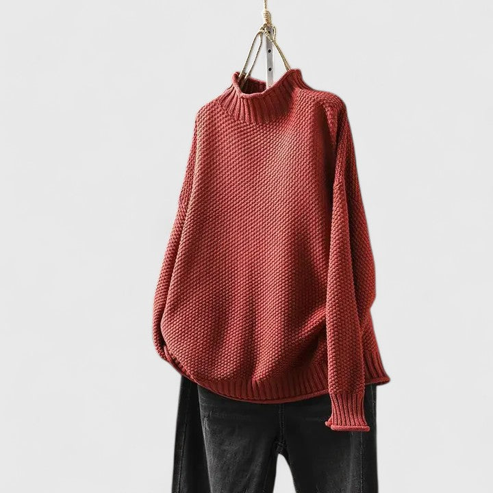 Women's textured knit mock neck sweater with ribbed cuffs and relaxed fit