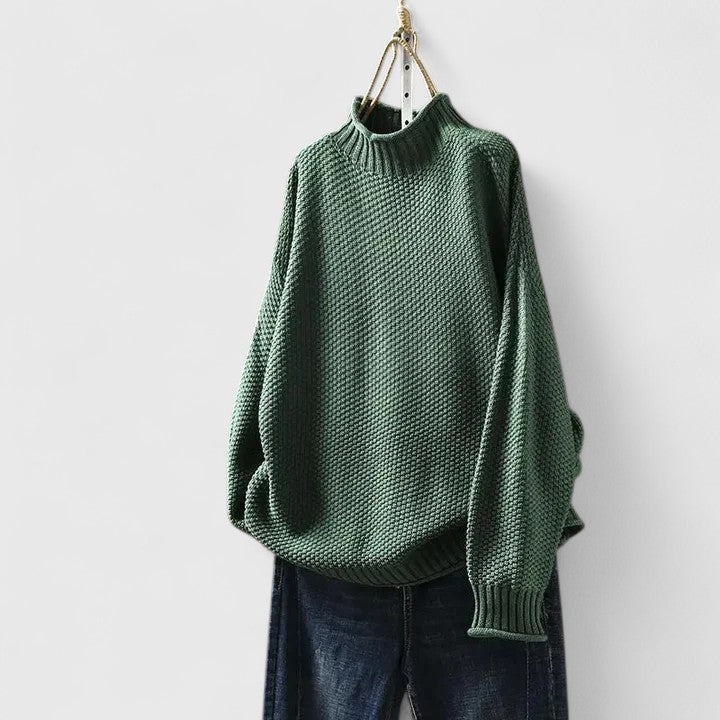 Women's textured knit mock neck sweater with ribbed cuffs and relaxed fit