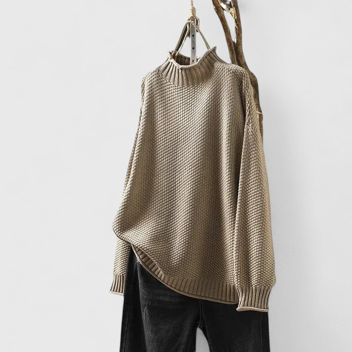 Women's textured knit mock neck sweater with ribbed cuffs and relaxed fit