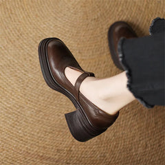 Rowena chunky block heel Mary Jane pumps with T-strap gold buckle and round toe