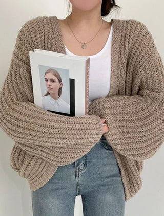 Oversized chunky knit cardigan with lantern sleeves and slouchy open-front silhouette