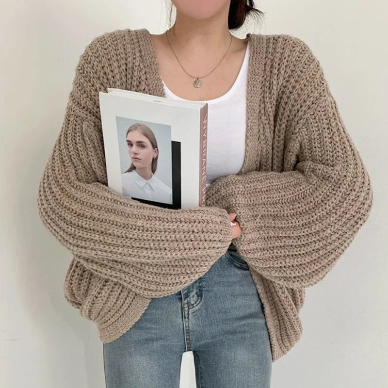 Oversized chunky knit cardigan with lantern sleeves and slouchy open-front silhouette