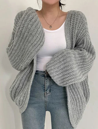 Oversized chunky knit cardigan with lantern sleeves and slouchy open-front silhouette