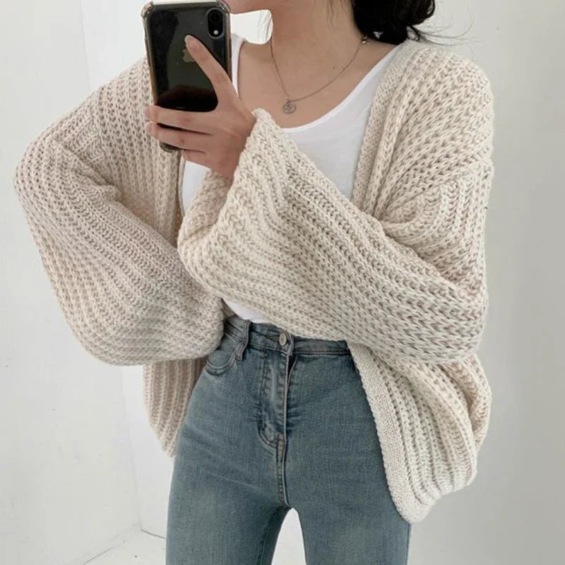 Oversized chunky knit cardigan with lantern sleeves and slouchy open-front silhouette