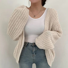 Oversized chunky knit cardigan with lantern sleeves and slouchy open-front silhouette