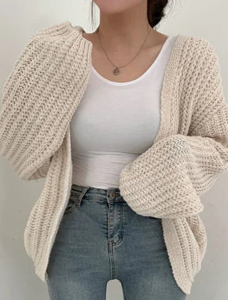 Oversized chunky knit cardigan with lantern sleeves and slouchy open-front silhouette