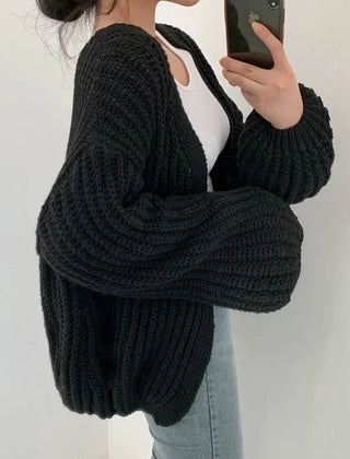 Oversized chunky knit cardigan with lantern sleeves and slouchy open-front silhouette