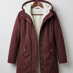 Women's hooded longline weatherproof coat with plush lining and front pockets