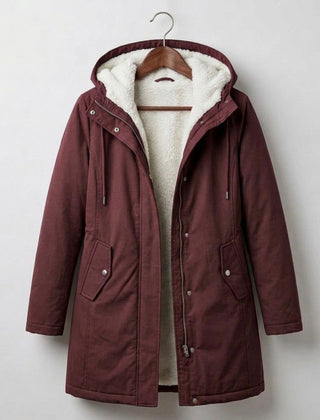 Women's hooded longline weatherproof coat with plush lining and front pockets